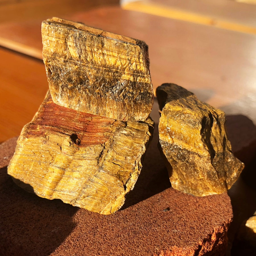 Working On Tigerās Eye Rough Stone - rawstone